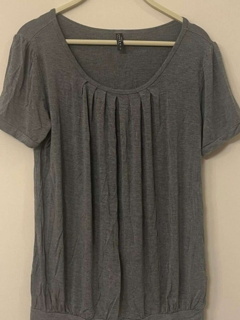 Grey short sleeve pleated scoop neck stretchy top shirt.